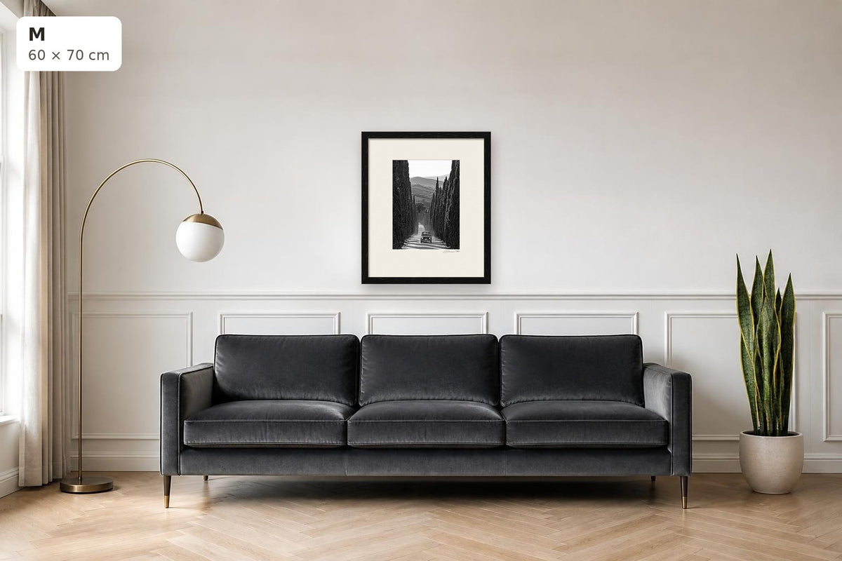 La Dolce Vita – fine art print by Duccio Nacci, size M with thin black frame shown above a sofa
