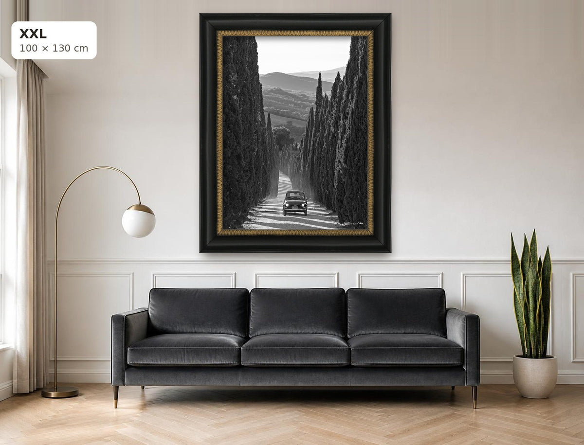 La Dolce Vita – fine art print by Duccio Nacci, size XXL with black and gold frame shown above a sofa
