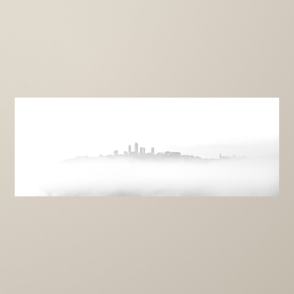 The Phantom City – A Tuscan hill town shrouded in morning mist, only its towers emerging – photograph by Duccio Nacci
