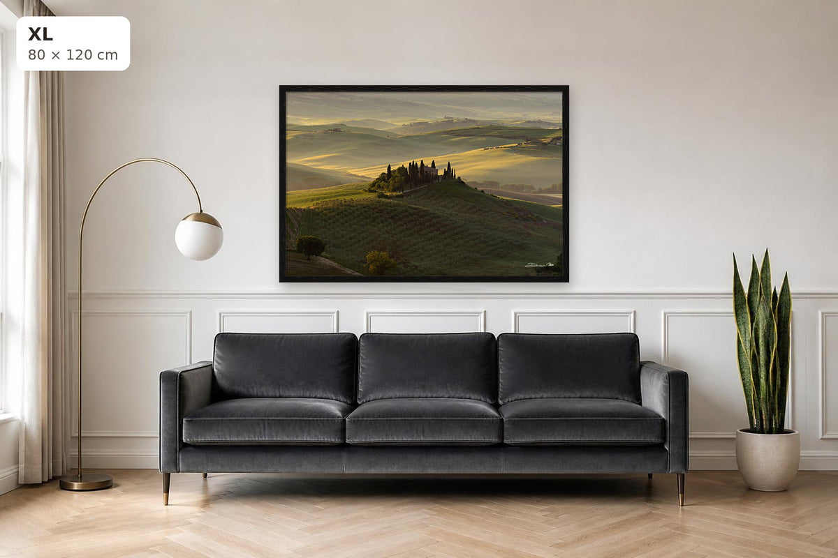 The Suspended Landscape – fine art print by Duccio Nacci, size XL with thin black frame shown above a sofa