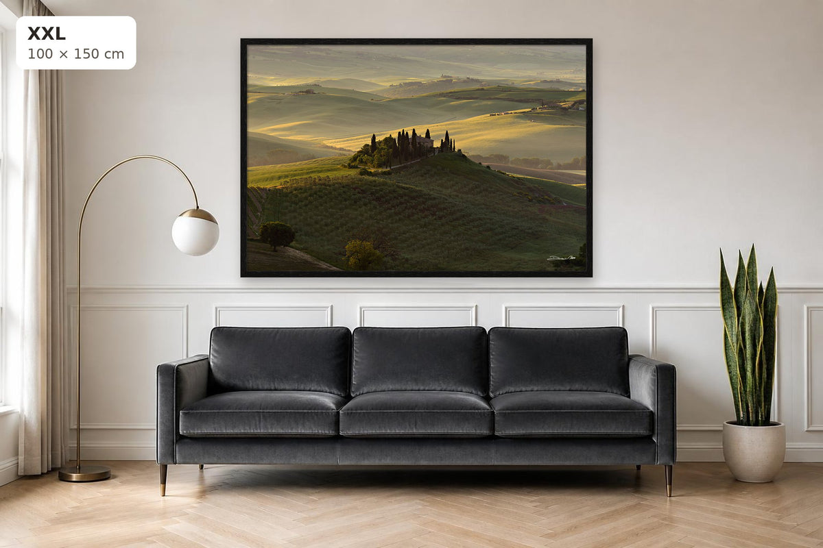 The Suspended Landscape – fine art print by Duccio Nacci, size XXL with thin black frame shown above a sofa