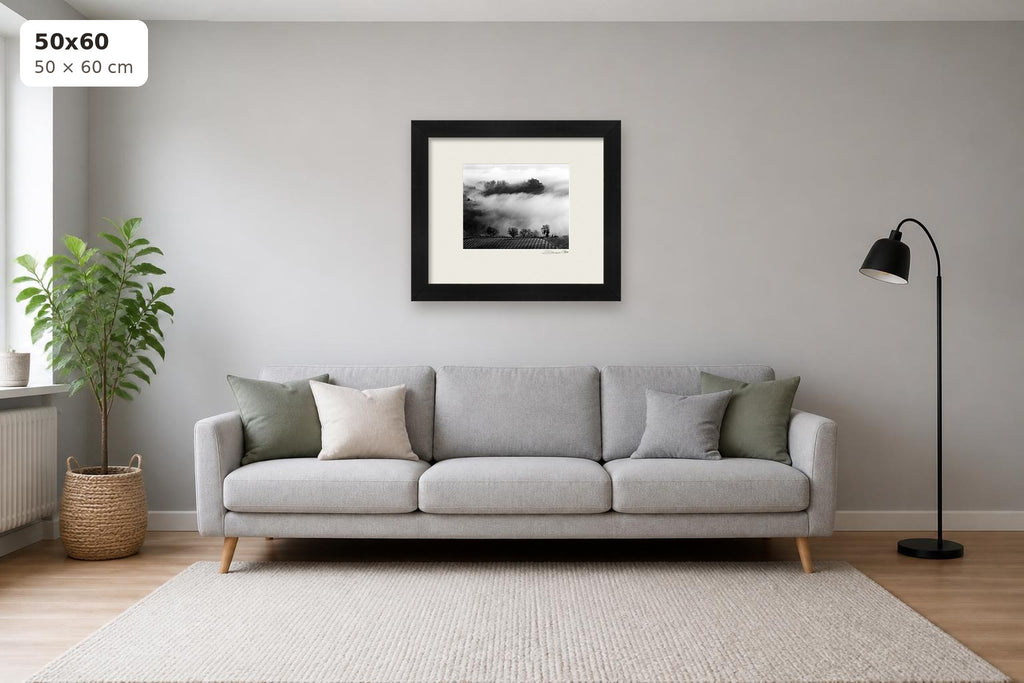Whispers in the Mist – fine art print by Duccio Nacci, size 50×60 cm shown above a sofa
